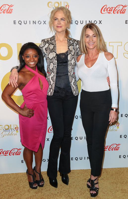 How tall is Simone Biles